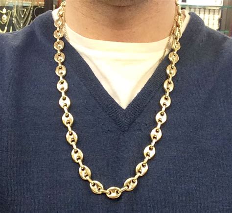 gold puff Gucci link chain